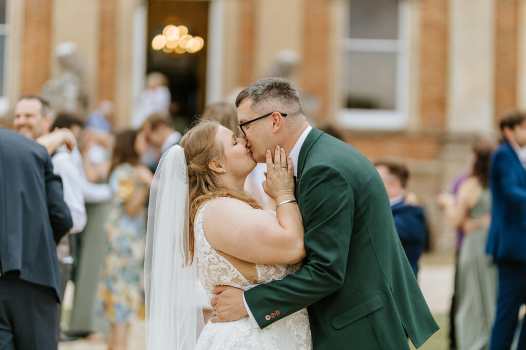 Bride and Groom dancing in the gardens at Crowcombe Court during a summer wedding in Somerset, captured by a Crowcombe Court wedding photographer.