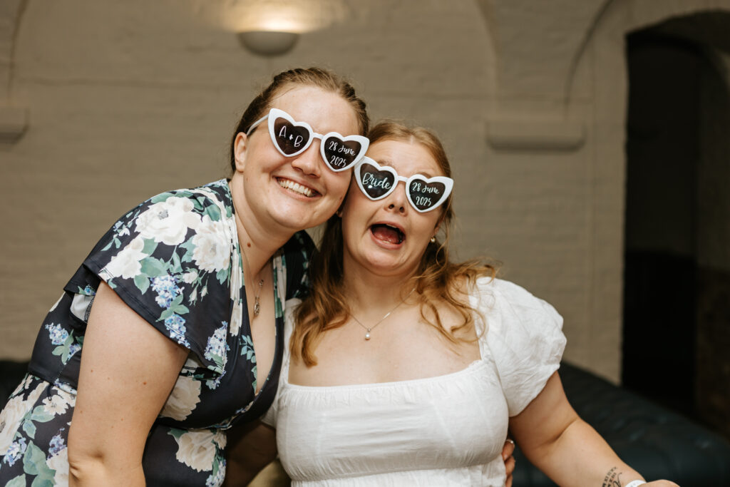 Dancing in the Undercroft at Crowcombe Court during a summer wedding in Somerset, captured by a Crowcombe Court wedding photographer.