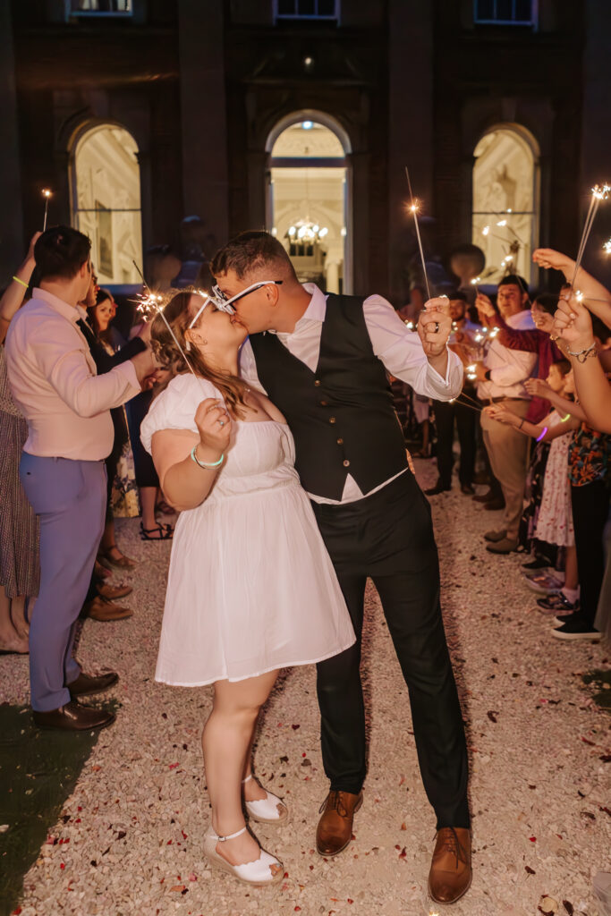Sparklers at Crowcombe Court during a summer wedding in Somerset, captured by a Crowcombe Court wedding photographer.