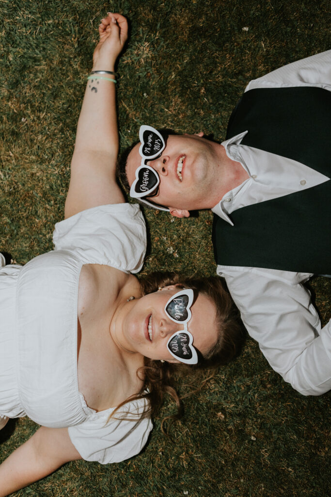 Bride and Groom at Crowcombe Court during a summer wedding in Somerset, captured by a Crowcombe Court wedding photographer.