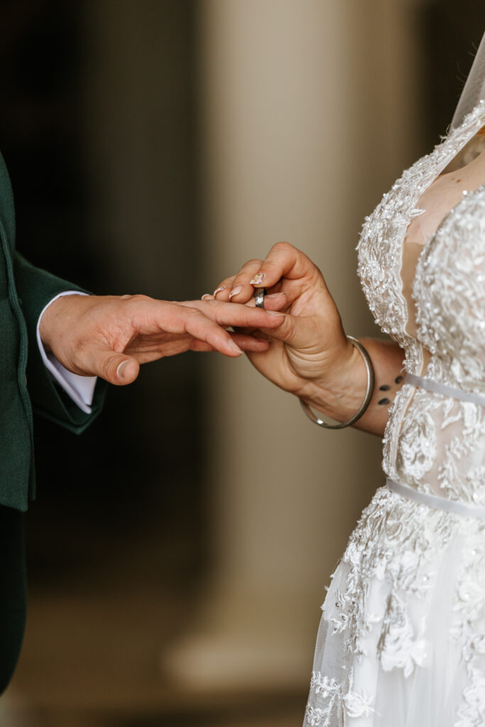 Bride and groom in the great hall at Crowcombe Court during a summer wedding in Somerset, captured by a Crowcombe Court wedding photographer.