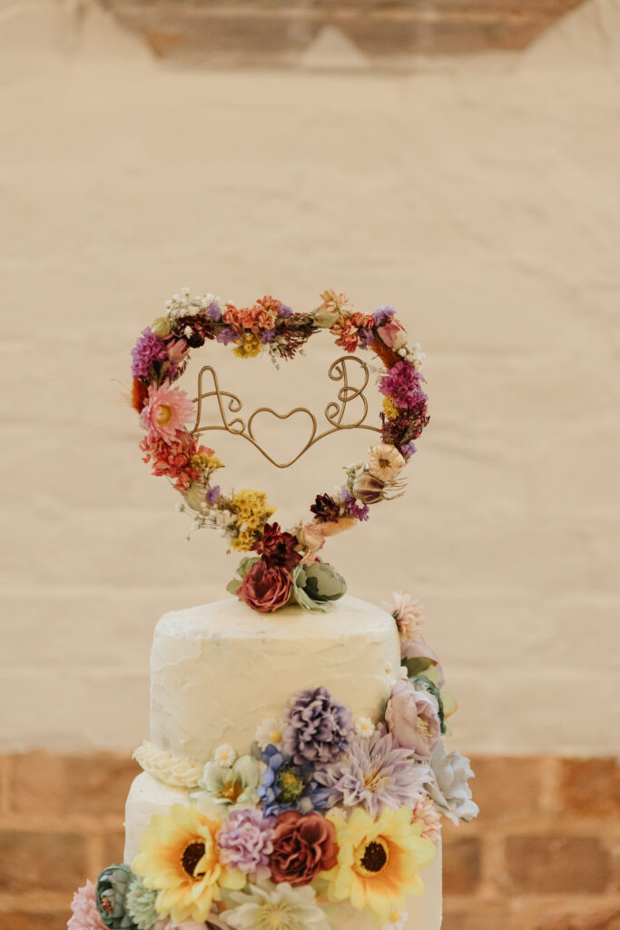 Wedding Cake at Crowcombe Court during a summer wedding in Somerset, captured by a Crowcombe Court wedding photographer.