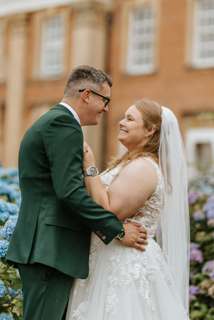 Bride and Groom Photos in the gardens at Crowcombe Court during a summer wedding in Somerset, captured by a Crowcombe Court wedding photographer.