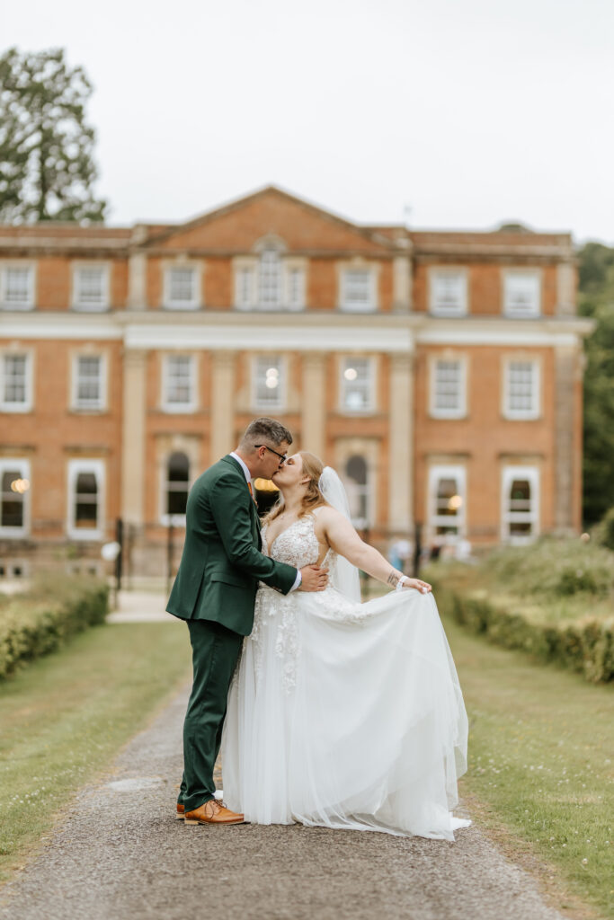 Couple Photos in the gardens at Crowcombe Court during a summer wedding in Somerset, captured by a Crowcombe Court wedding photographer.