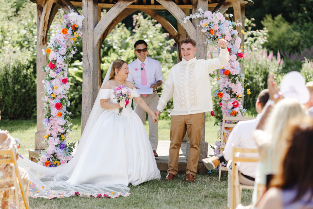 Bride and groom at Priston Mill near Bath with Bridgeton style decor