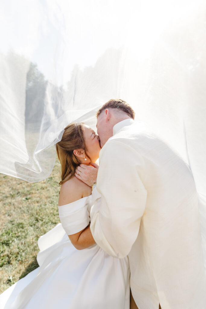 Under the veil kiss at Priston Mill near Bath