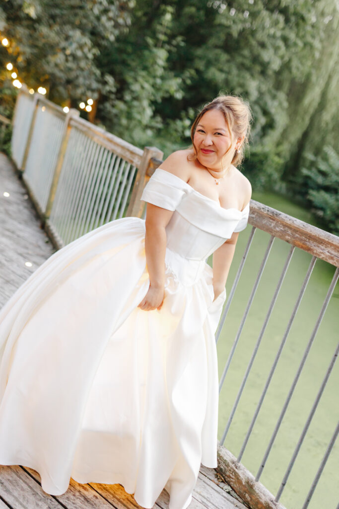 Beautiful filipino bride on the balcony at The Watermill at Priston Mill near Bath